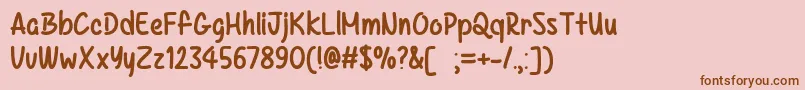 Fonte KazincbarcikaTtf – fontes marrons em um fundo rosa