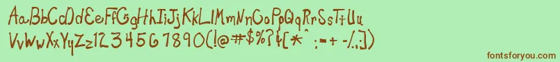 New Toy Font – Brown Fonts on Green Background