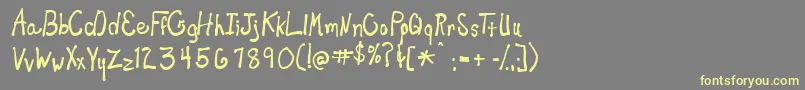 New Toy Font – Yellow Fonts on Gray Background