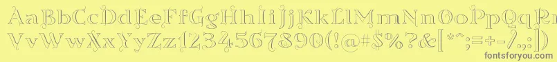 Sortefaxs01 Font – Gray Fonts on Yellow Background