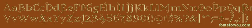 フォントSortefaxs01 – 緑色の文字が茶色の背景にあります。