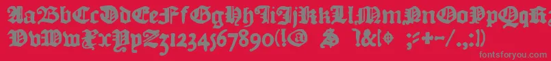 フォントDkCourant – 赤い背景に灰色の文字