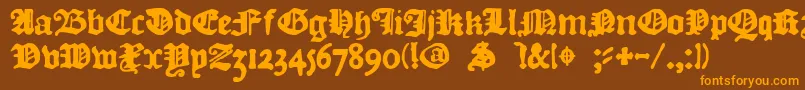 フォントDkCourant – オレンジ色の文字が茶色の背景にあります。