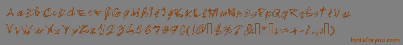 フォントEgidovalHandstyle1 – 茶色の文字が灰色の背景にあります。