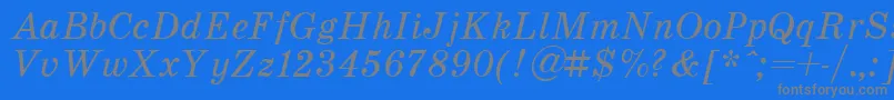 SchoolItalic-fontti – harmaat kirjasimet sinisellä taustalla