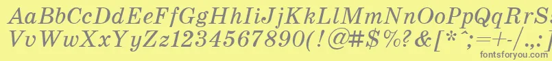 SchoolItalic-Schriftart – Graue Schriften auf gelbem Hintergrund