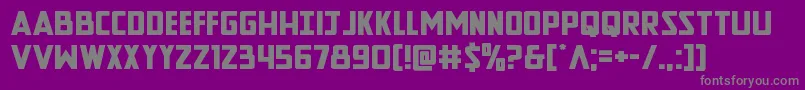 Newcomictitleexpand-fontti – harmaat kirjasimet violetilla taustalla
