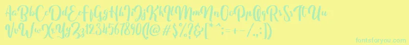 FitamintScript Font – Green Fonts on Yellow Background