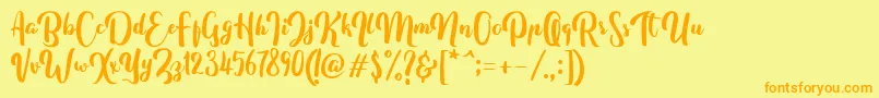 FitamintScript Font – Orange Fonts on Yellow Background