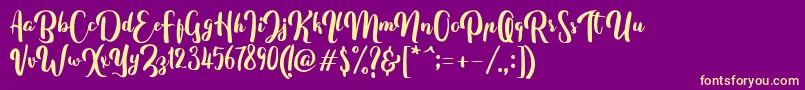 FitamintScript Font – Yellow Fonts on Purple Background