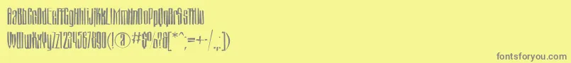 Montblancbrokenc Font – Gray Fonts on Yellow Background
