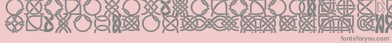 フォントDsCelticBorder1 – ピンクの背景に灰色の文字