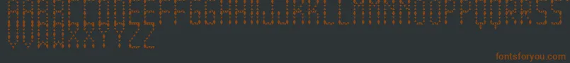 EspinudaTfb Font – Brown Fonts on Black Background