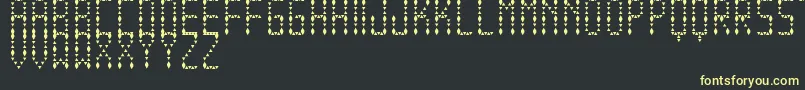 EspinudaTfb Font – Yellow Fonts on Black Background