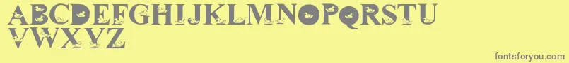 LmsDavidsDucks-fontti – harmaat kirjasimet keltaisella taustalla
