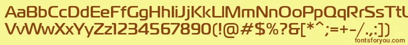 フォントPtMagistralBoldCyrillic – 茶色の文字が黄色の背景にあります。