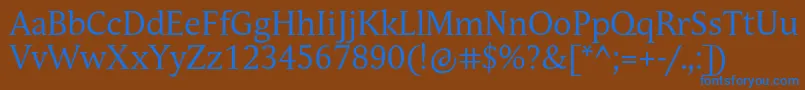 Czcionka AndulkaBookPro – niebieskie czcionki na brązowym tle