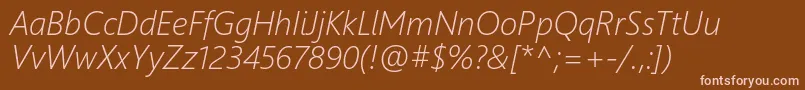フォントSegoeUiLightItalic – 茶色の背景にピンクのフォント