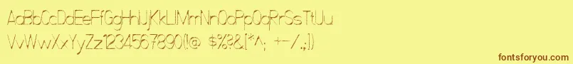 ScrfibbleRaw Font – Brown Fonts on Yellow Background