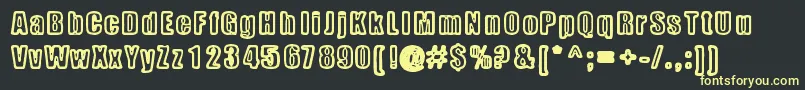 Metalbox Font – Yellow Fonts on Black Background