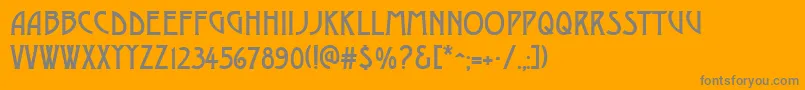 DustinesolidRegular-Schriftart – Graue Schriften auf orangefarbenem Hintergrund
