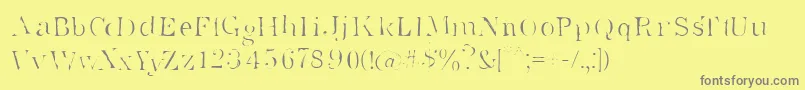 フォントSupersta – 黄色の背景に灰色の文字