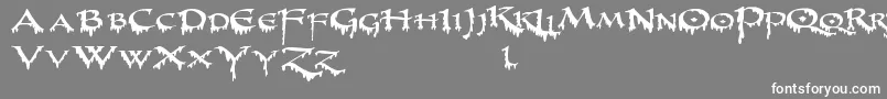 フォントPrUncialCreepyWide – 灰色の背景に白い文字