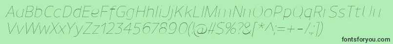 フォントUnimanUltralightitalic – 緑の背景に黒い文字