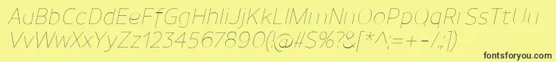 Fonte UnimanUltralightitalic – fontes pretas em um fundo amarelo