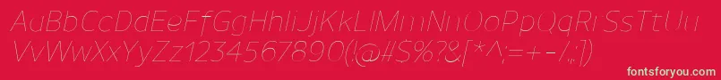 フォントUnimanUltralightitalic – 赤い背景に緑の文字