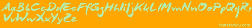 Czcionka DeborstelBrushReduced – zielone czcionki na pomarańczowym tle