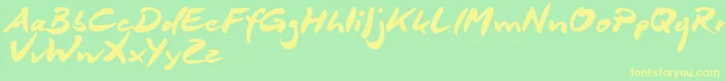 DeborstelBrushReduced Font – Yellow Fonts on Green Background