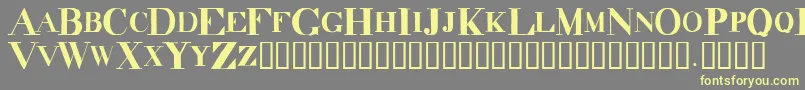 Fonte DecadenceItdCondensed – fontes amarelas em um fundo cinza