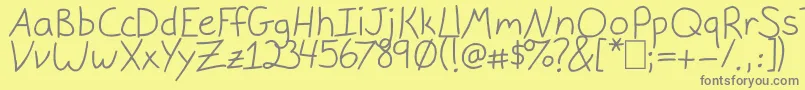 GracieLight-fontti – harmaat kirjasimet keltaisella taustalla
