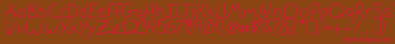 フォントGracieLight – 赤い文字が茶色の背景にあります。