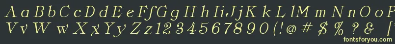 フォントClassicaItalic – 黒い背景に黄色の文字