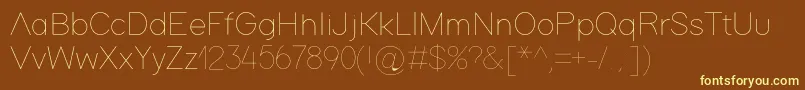 Adam Font – Yellow Fonts on Brown Background