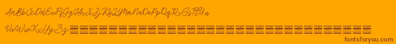 AntiqueDemo-Schriftart – Braune Schriften auf orangefarbenem Hintergrund