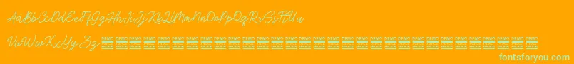 AntiqueDemo-Schriftart – Grüne Schriften auf orangefarbenem Hintergrund