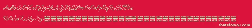 AntiqueDemo Font – Green Fonts on Red Background