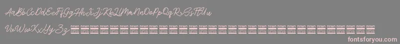Шрифт AntiqueDemo – розовые шрифты на сером фоне