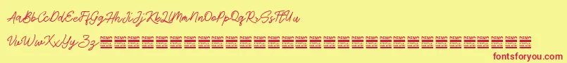 AntiqueDemo-fontti – punaiset fontit keltaisella taustalla
