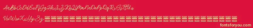 AntiqueDemo-fontti – keltaiset fontit punaisella taustalla