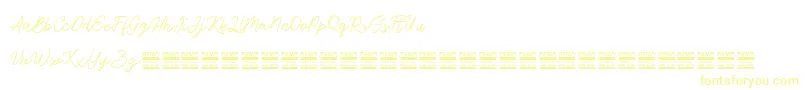 フォントAntiqueDemo – 白い背景に黄色の文字