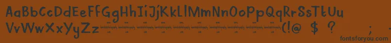 DkMamaBear-Schriftart – Schwarze Schriften auf braunem Hintergrund