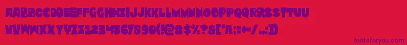 Czcionka Zounderkitecond – fioletowe czcionki na czerwonym tle