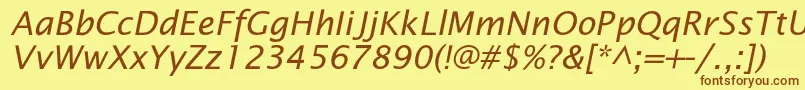 フォントOfficetypesansItalic – 茶色の文字が黄色の背景にあります。