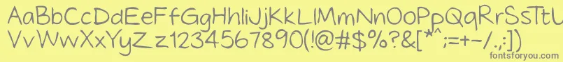 Tidyhand-fontti – harmaat kirjasimet keltaisella taustalla