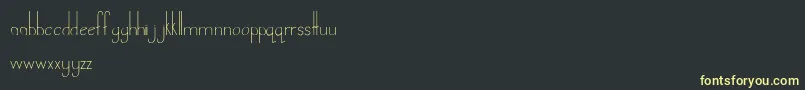 LandDownunder Font – Yellow Fonts on Black Background