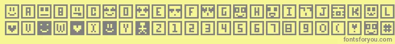 Fonte Sqcon – fontes cinzas em um fundo amarelo